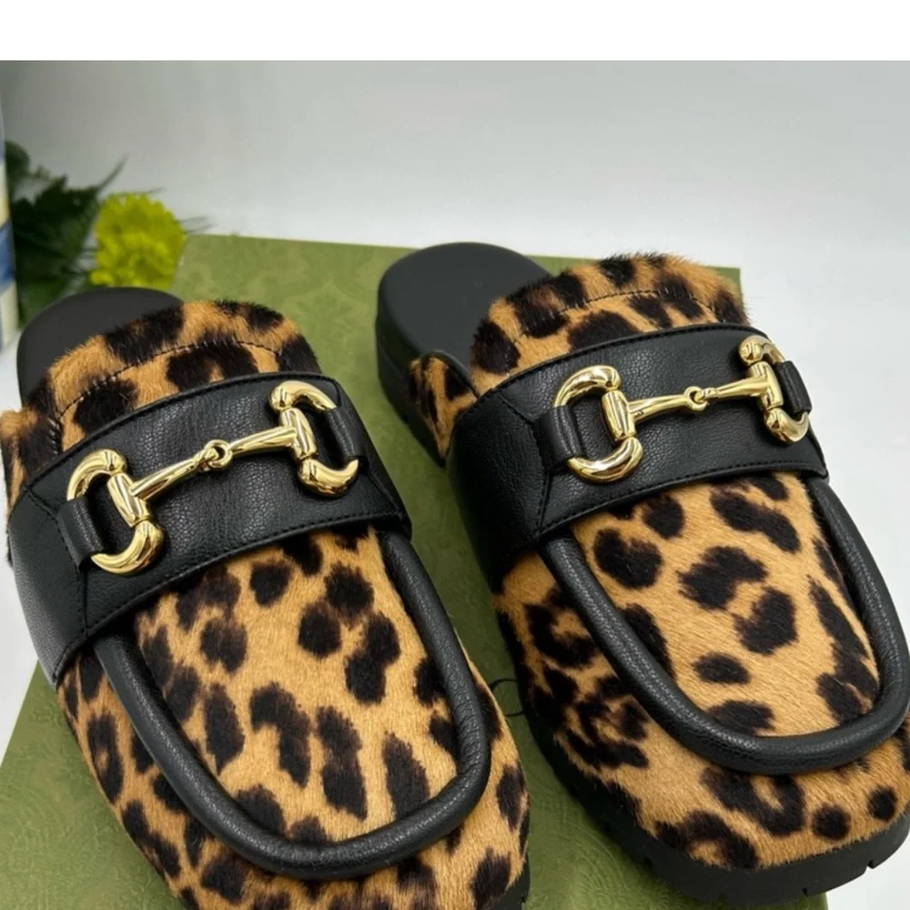 Gucci Leopard Print Mules with Gold Accents - Picture 1 of 7